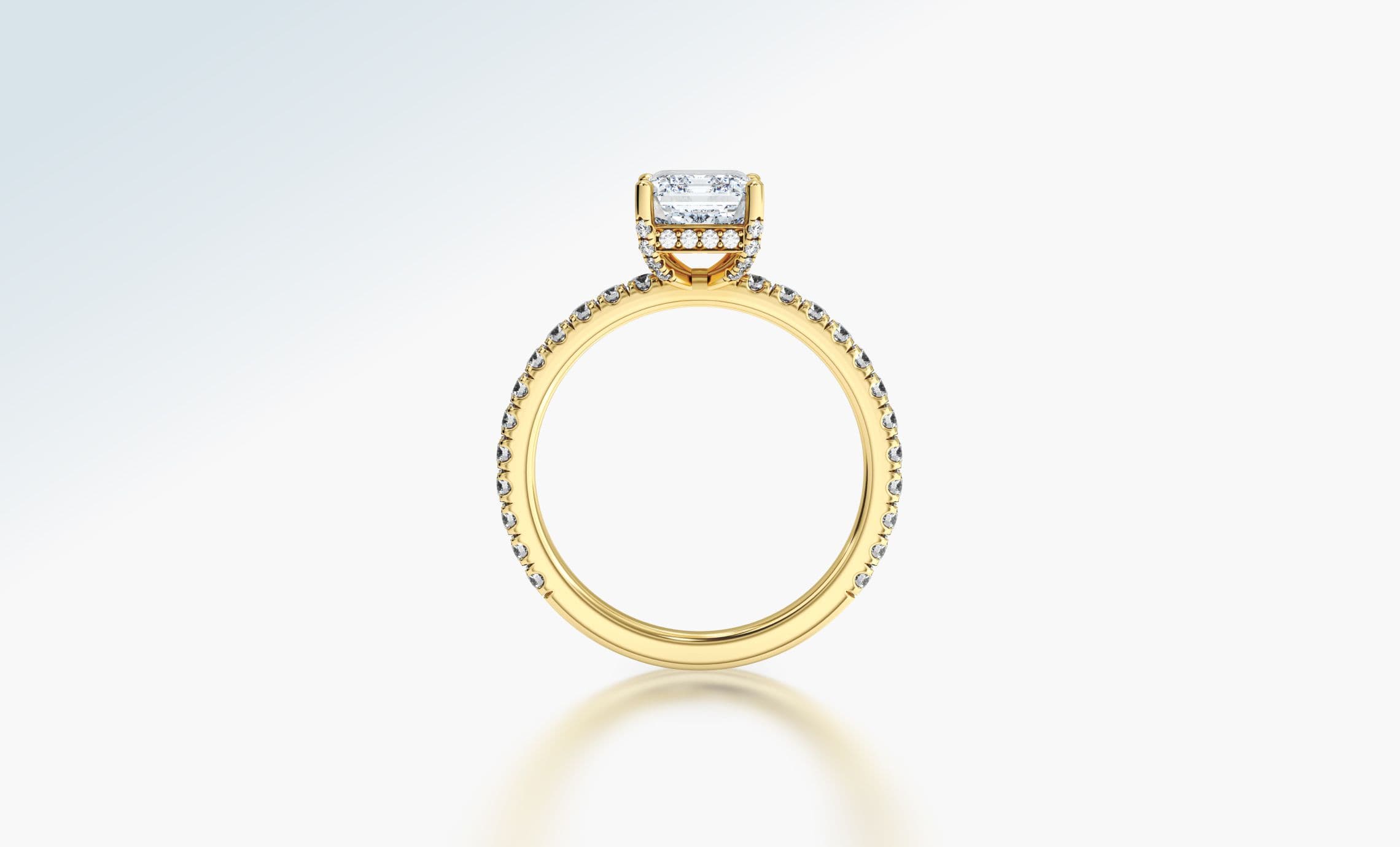 Profile view of a gold diamond engagement ring