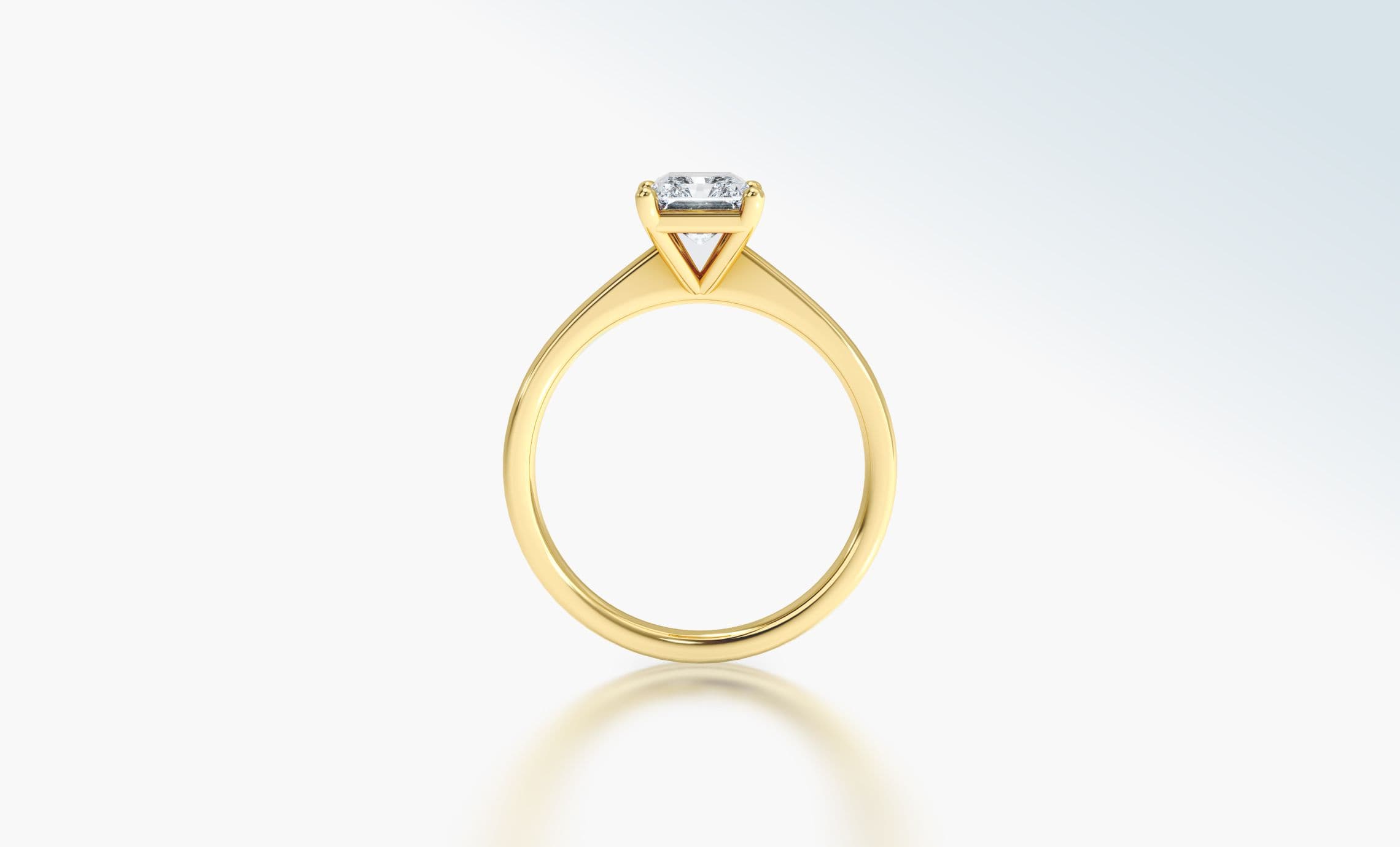 Profile view of a gold diamond engagement ring